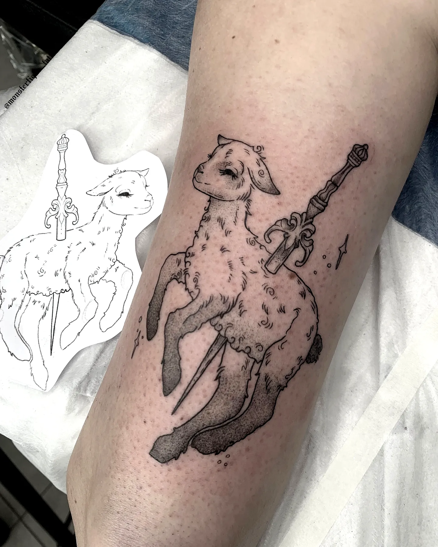 Stylized Lamb Arm Tattoo with Sword