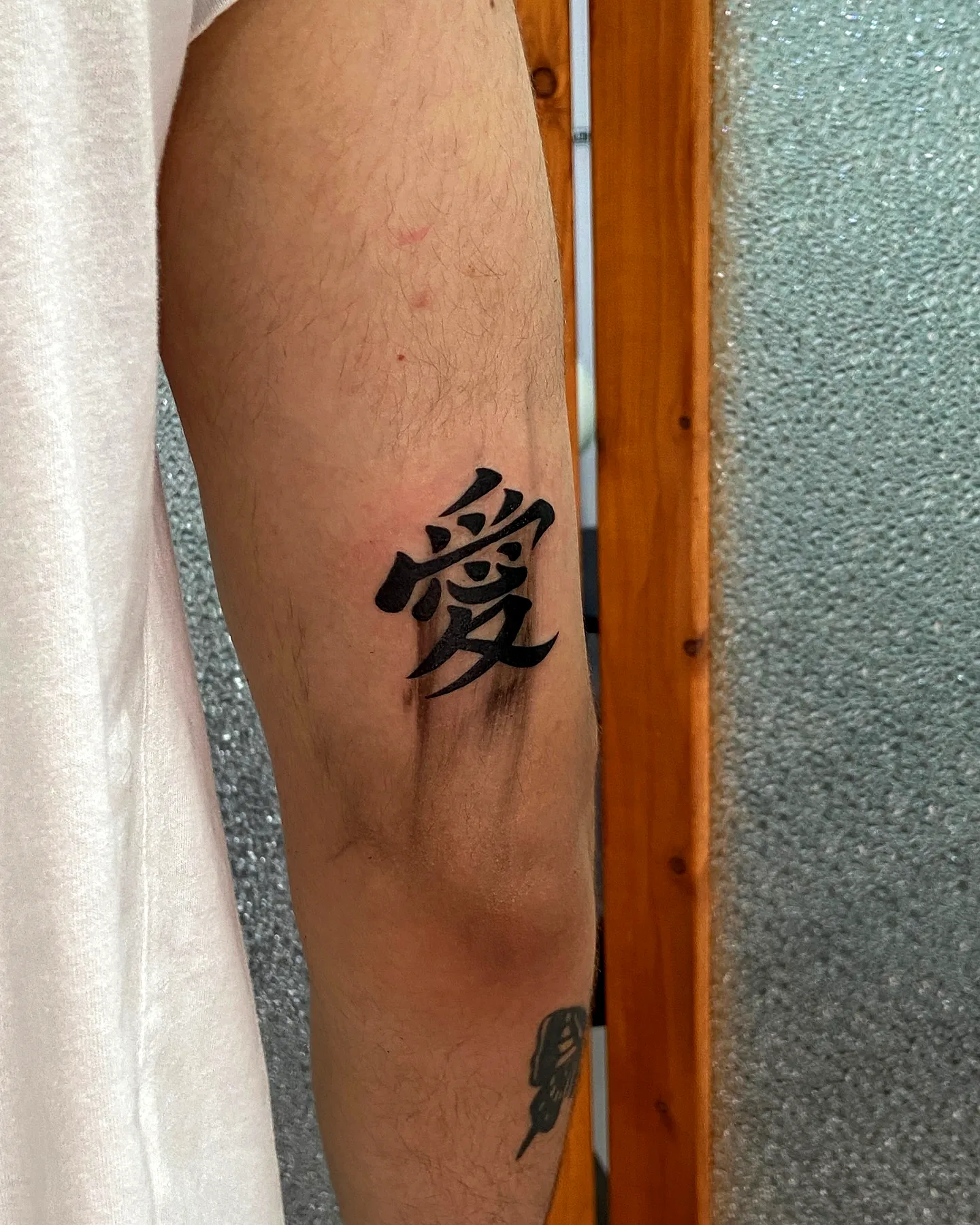 Stylized Love Forearm Tattoo