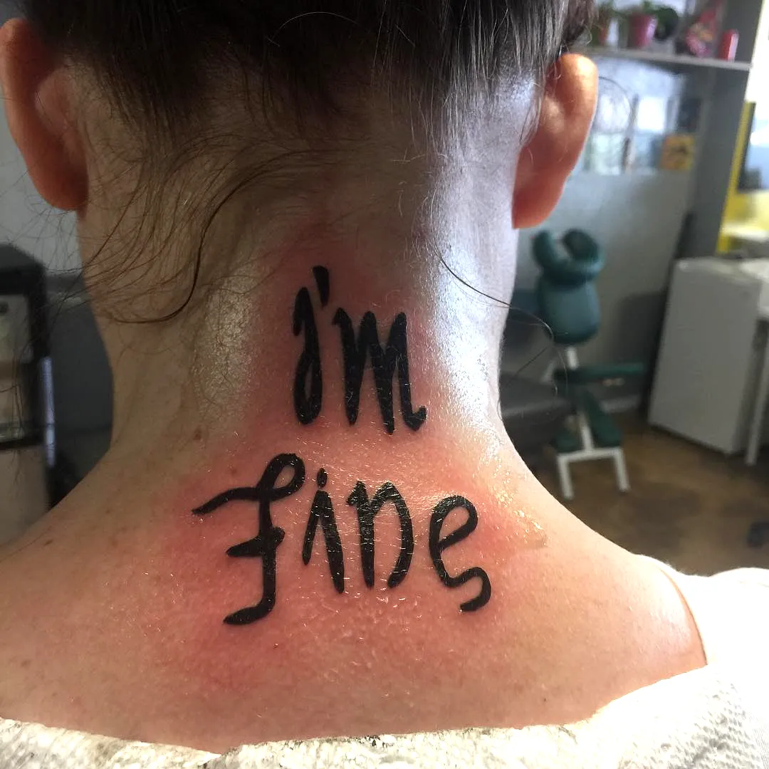 Stylized Script Neck Tattoo in Black