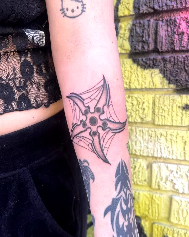 Stylized Spider Web Forearm Tattoo