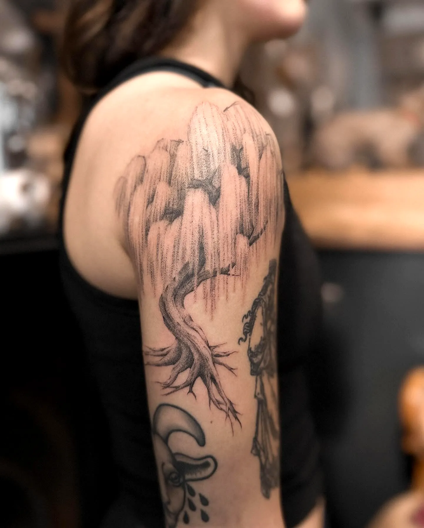 Stylized Tree Upper Arm Tattoo