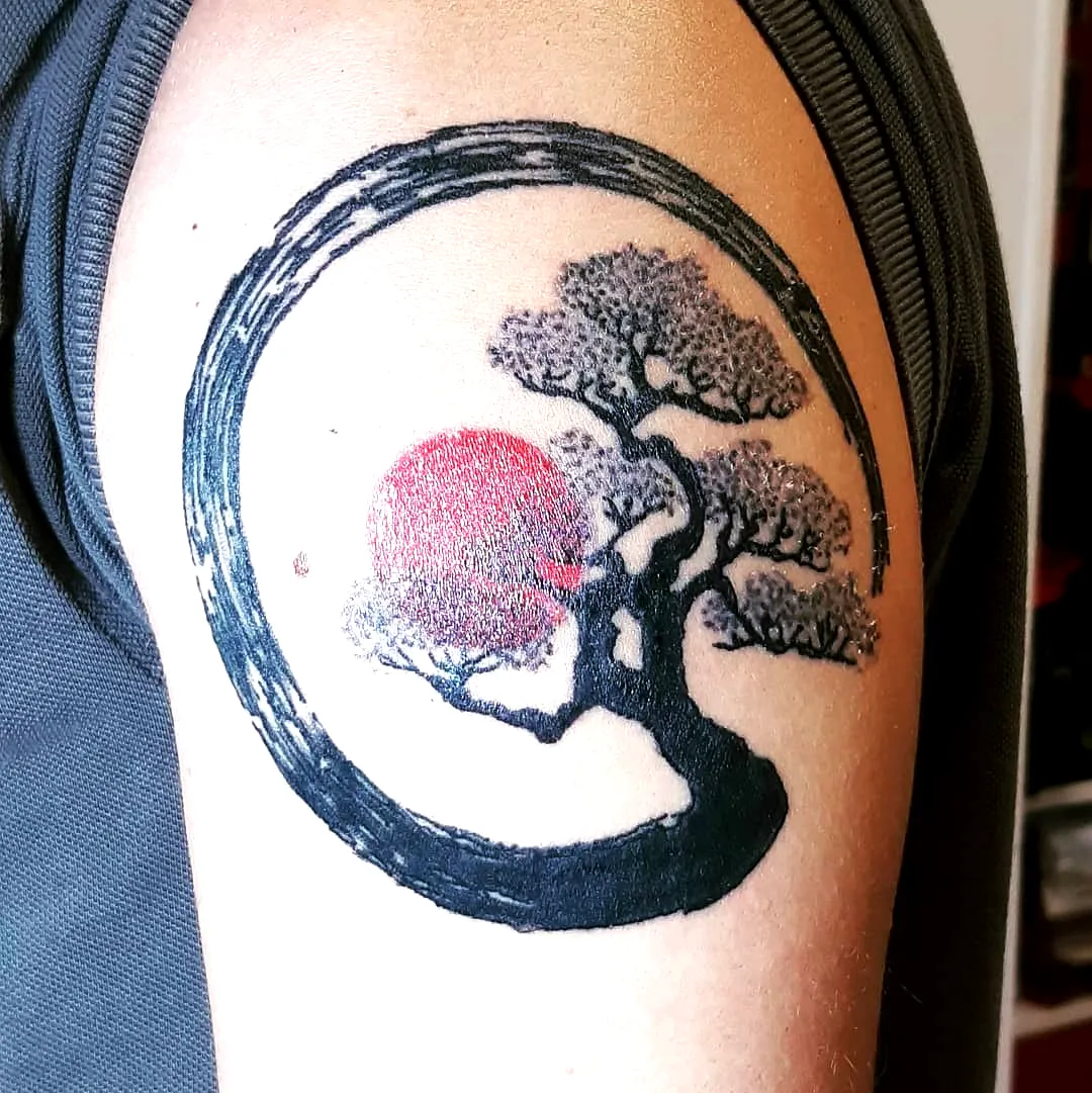 Stylized Tree Upper Arm Tattoo