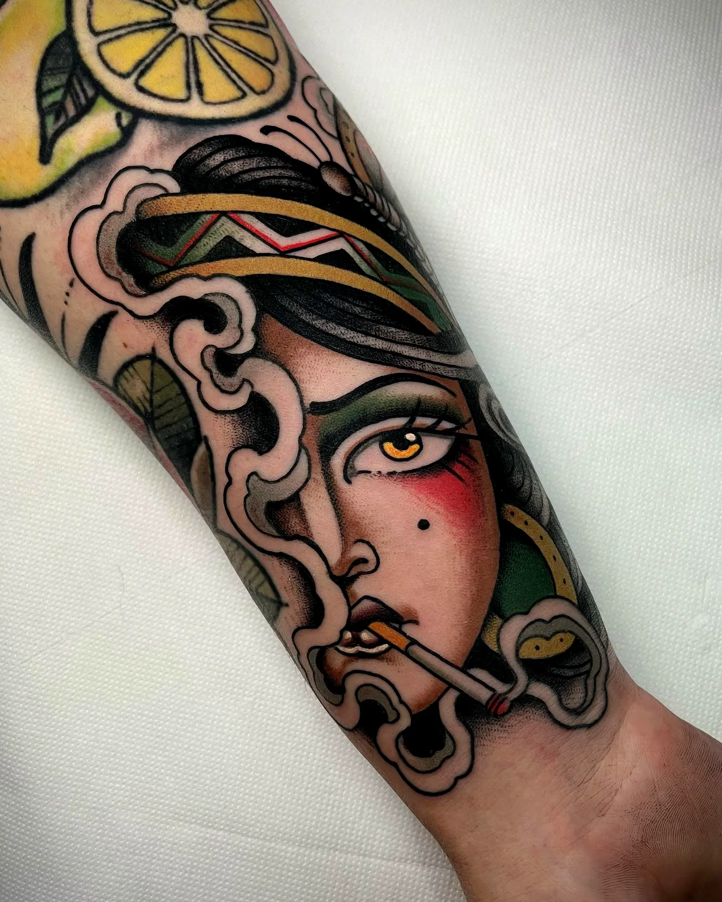 Stylized Woman Forearm Smoking Tattoo