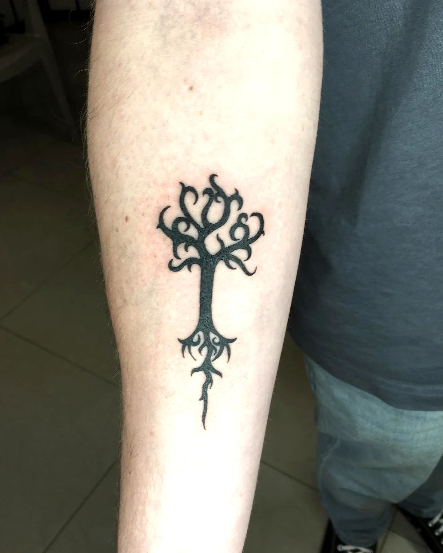Stylized Yggdrasil Forearm Tattoo