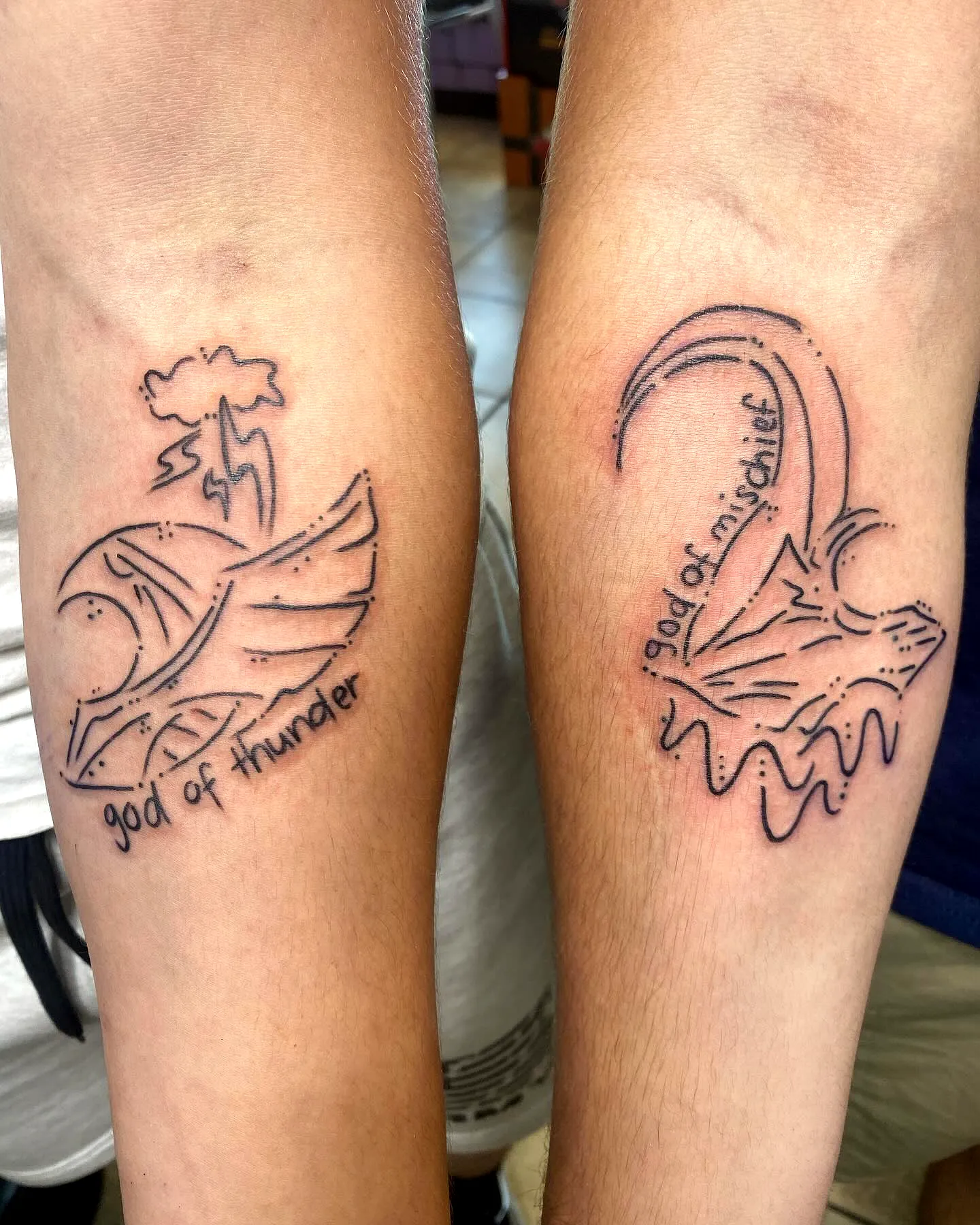 Sun and Wave Forearm Tattoos