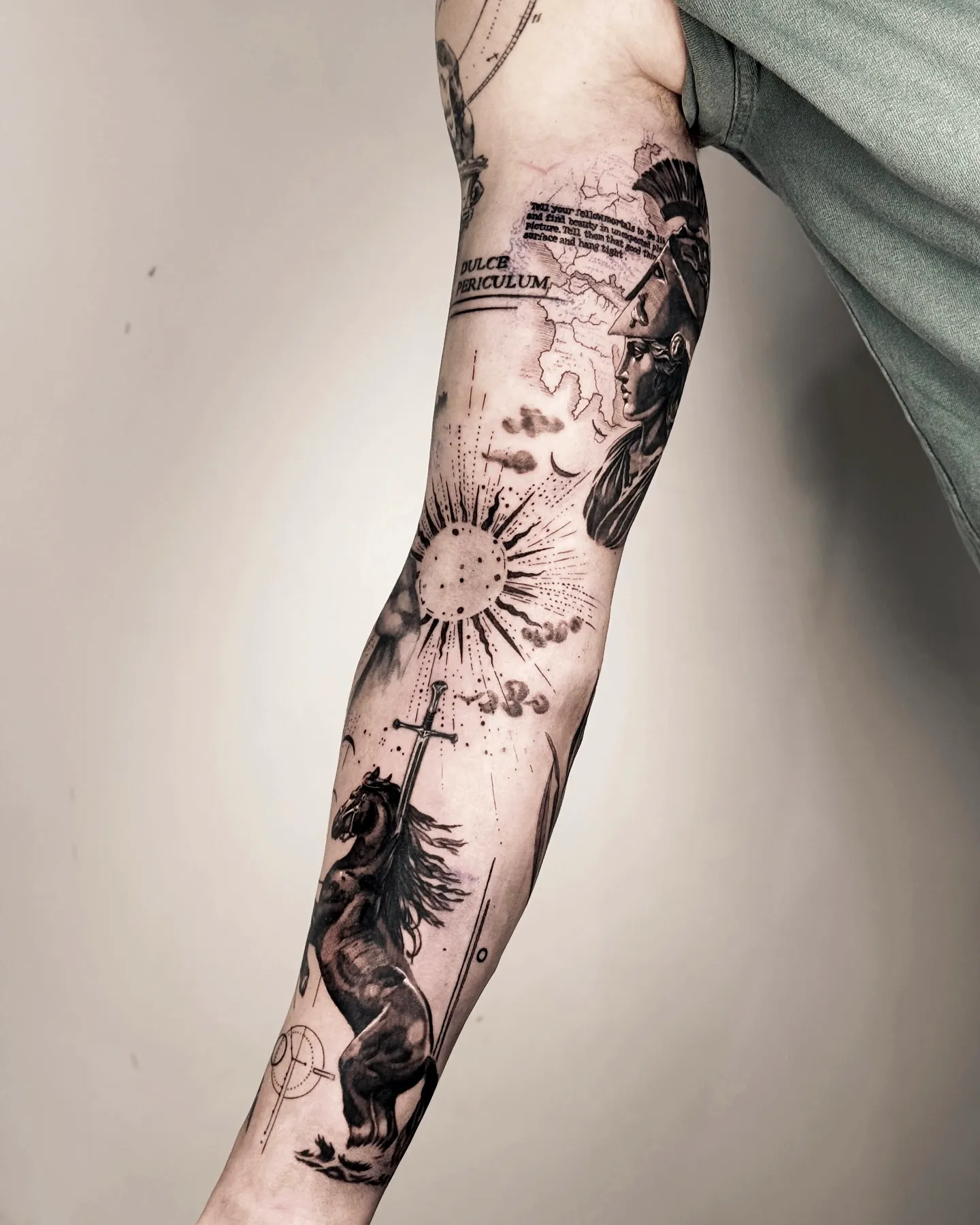 Surreal Horse Forearm Tattoo in Black and Gray