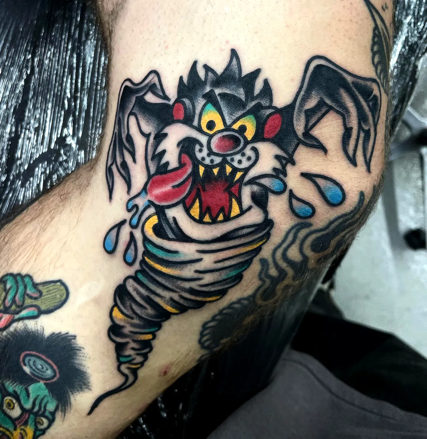 Taz Tornado Arm Tattoo in Bold Colors