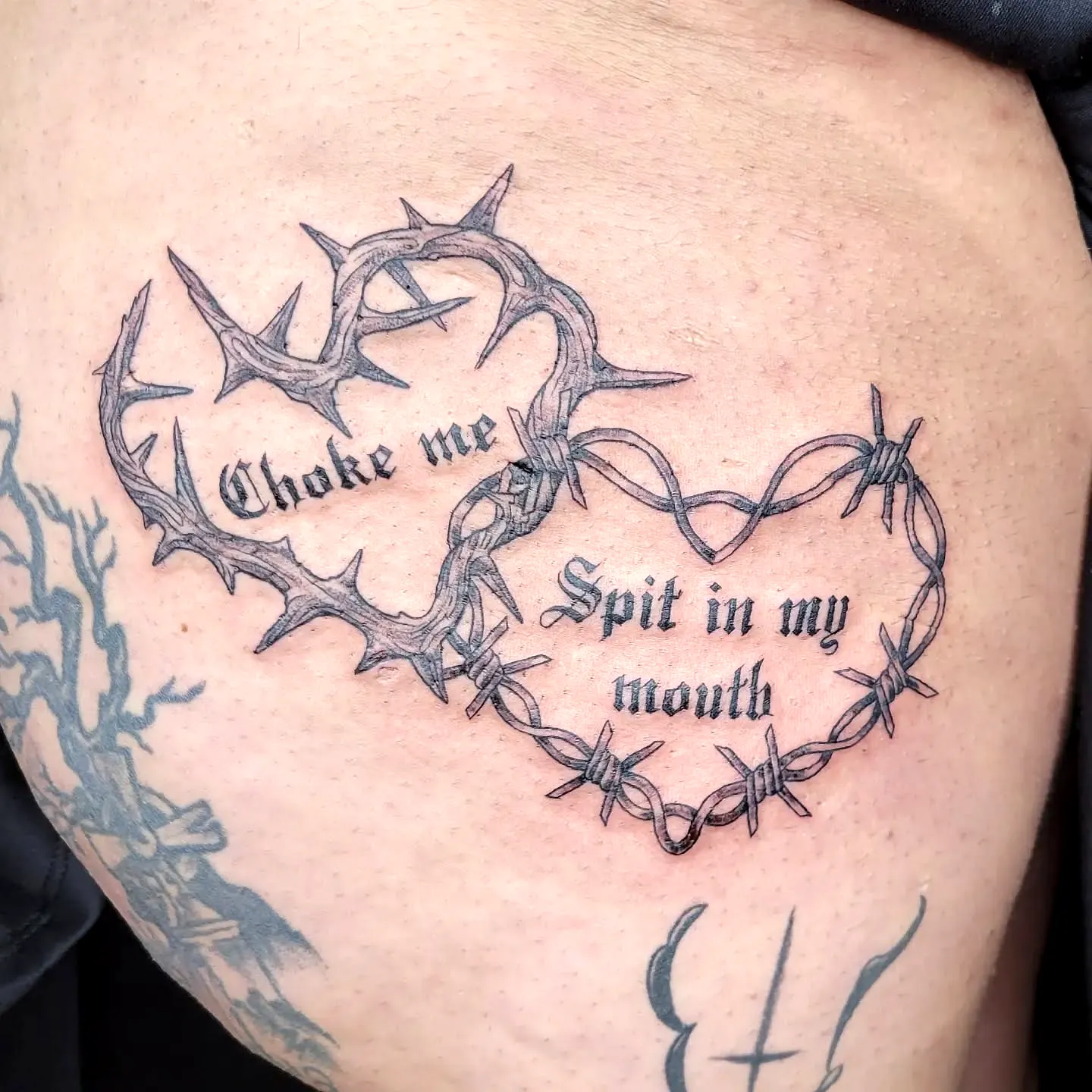Thorny Heart Thigh Tattoo