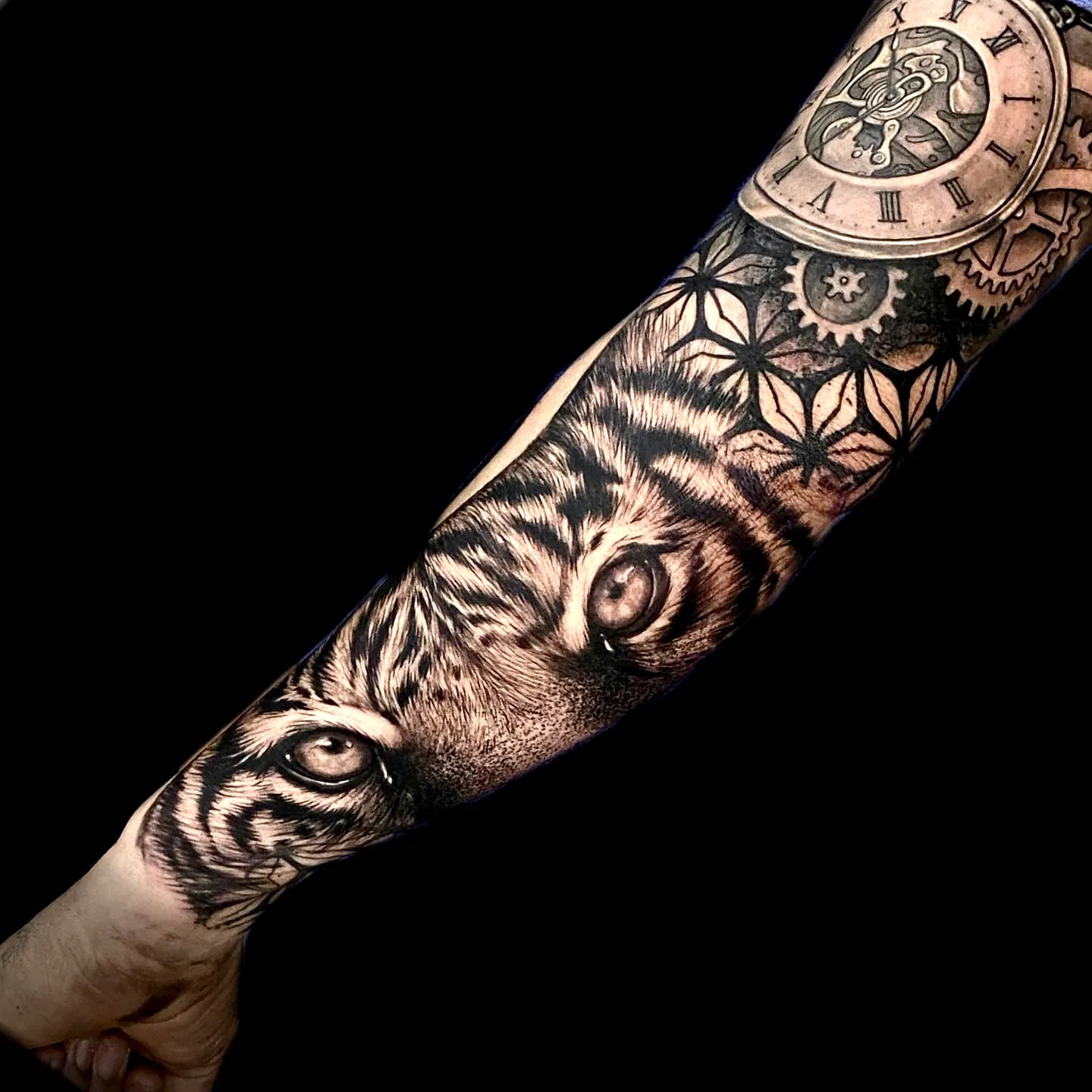 Tiger Forearm Tattoo with Clock and Geometry