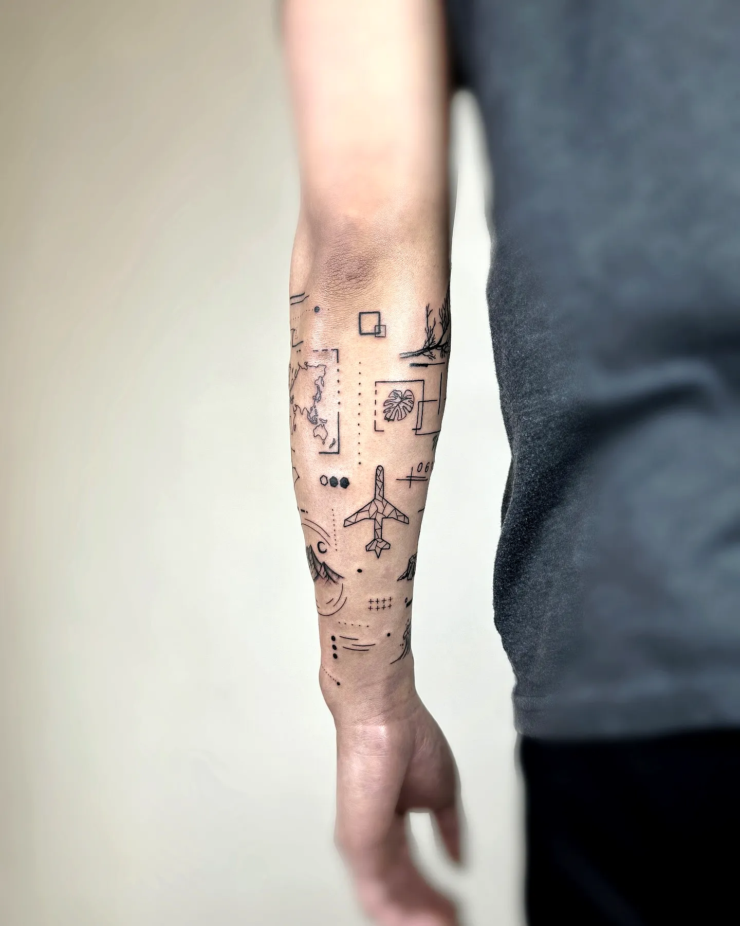 Travel Elements Forearm Tattoo