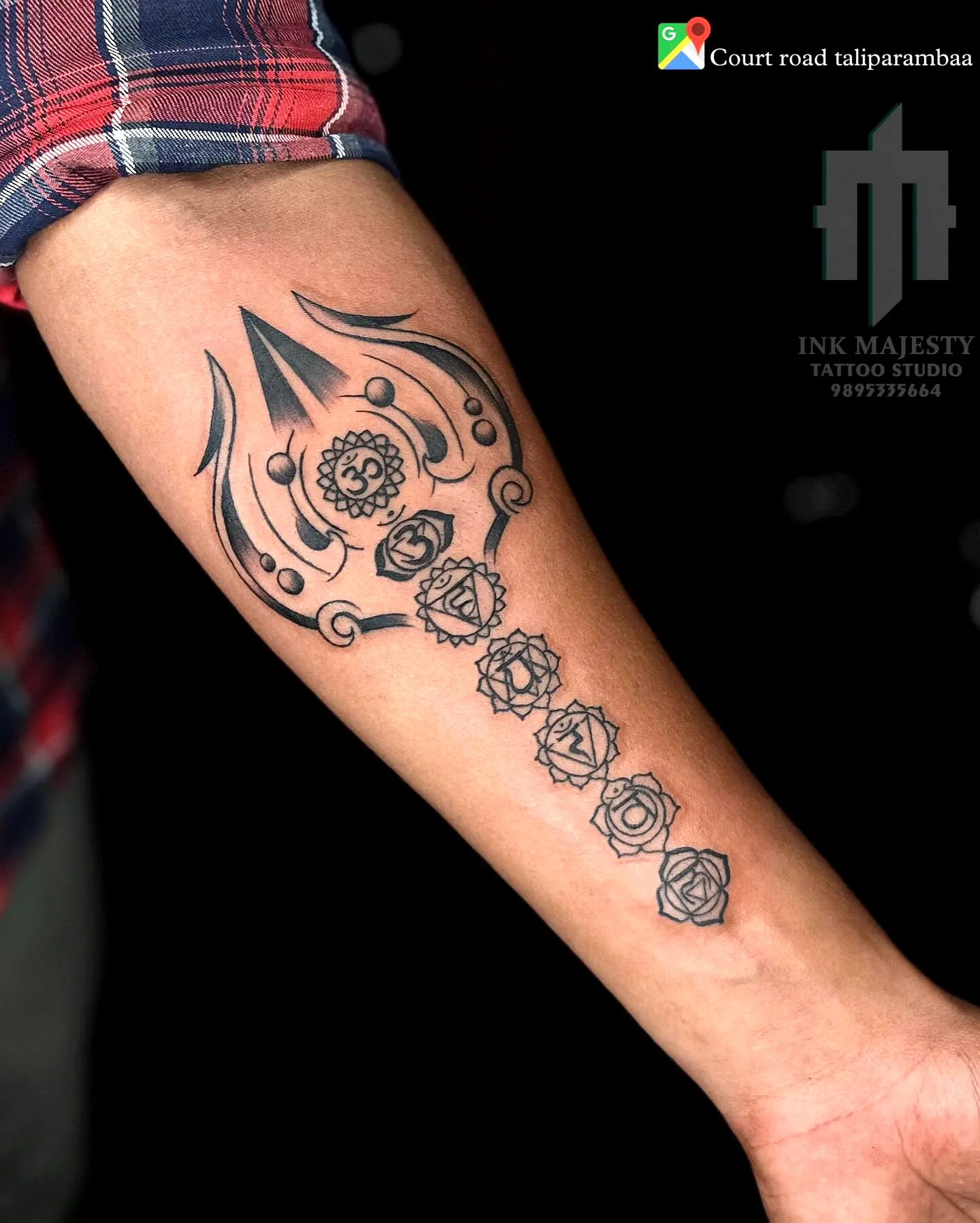 Trident Forearm Tattoo with Roses