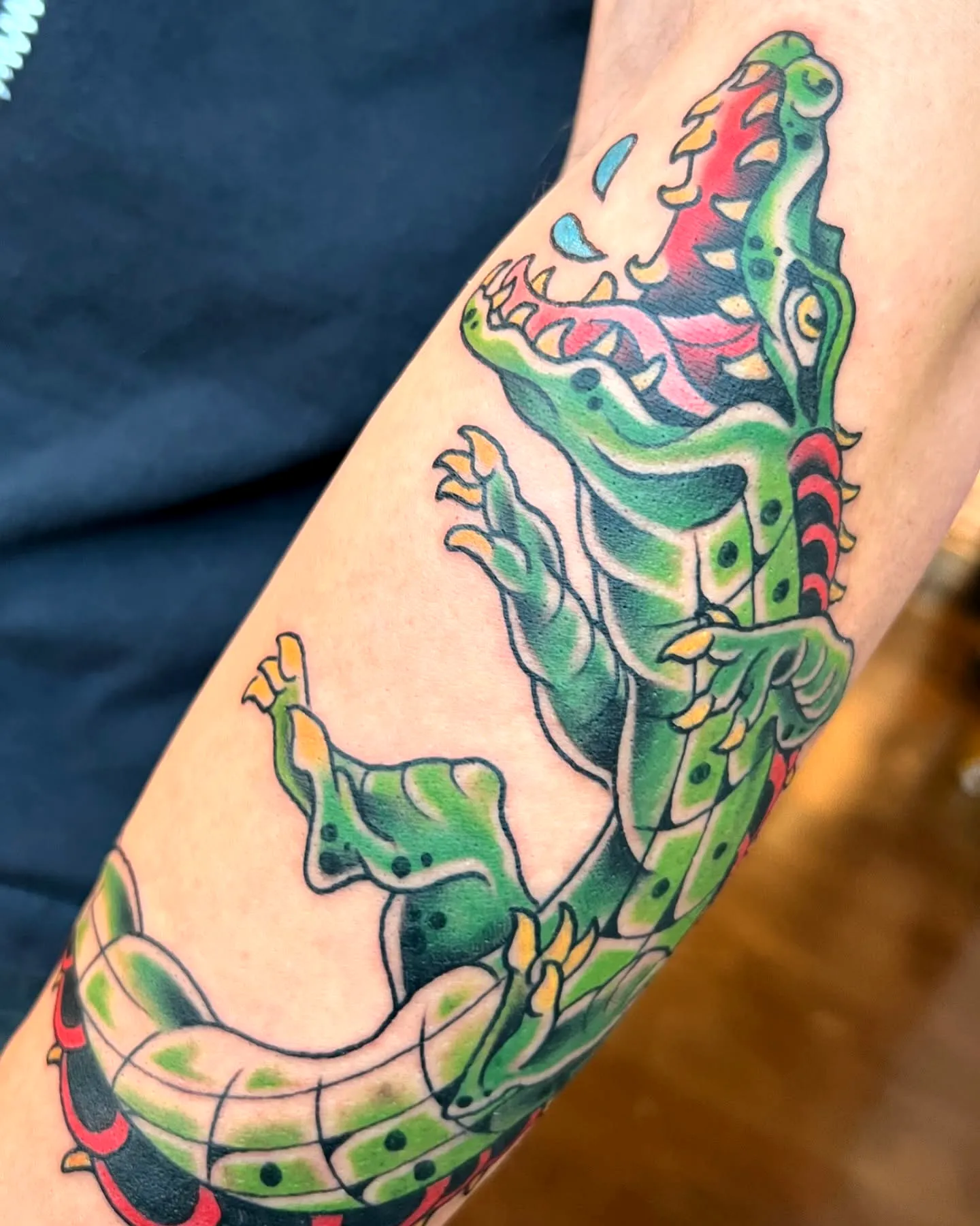 Vibrant Crocodile Forearm Tattoo