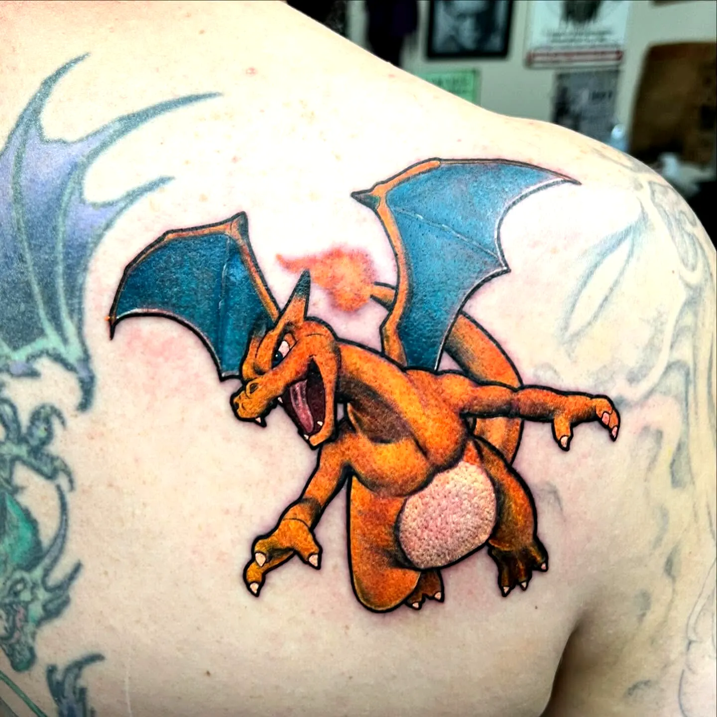 Vibrant Dragon Upper Back Tattoo