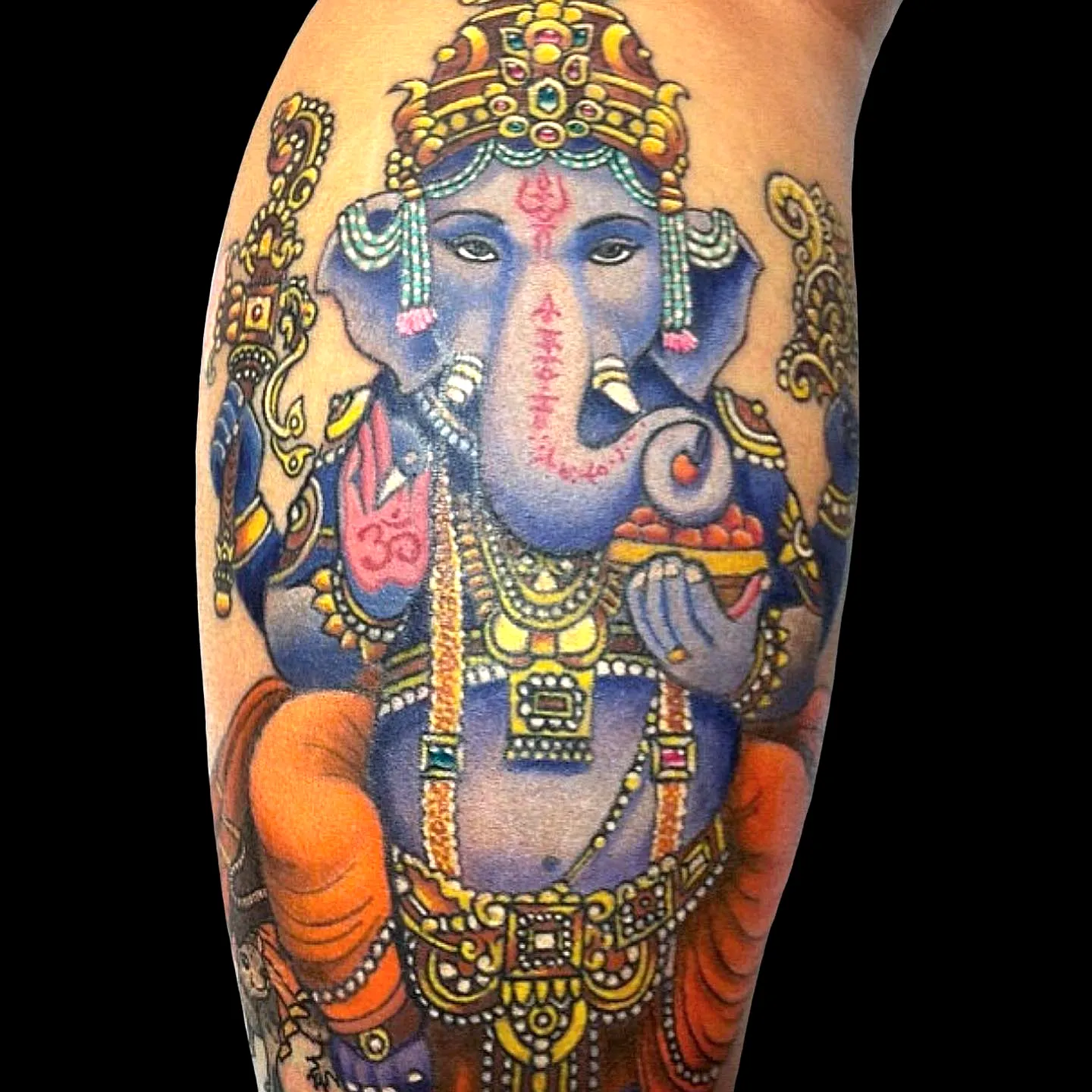 Vibrant Lord Ganesha Arm Tattoo