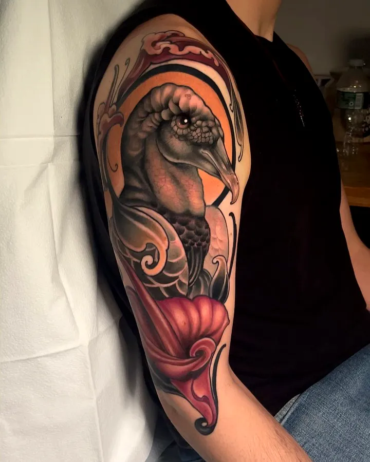 Vibrant Vulture Upper Arm Tattoo