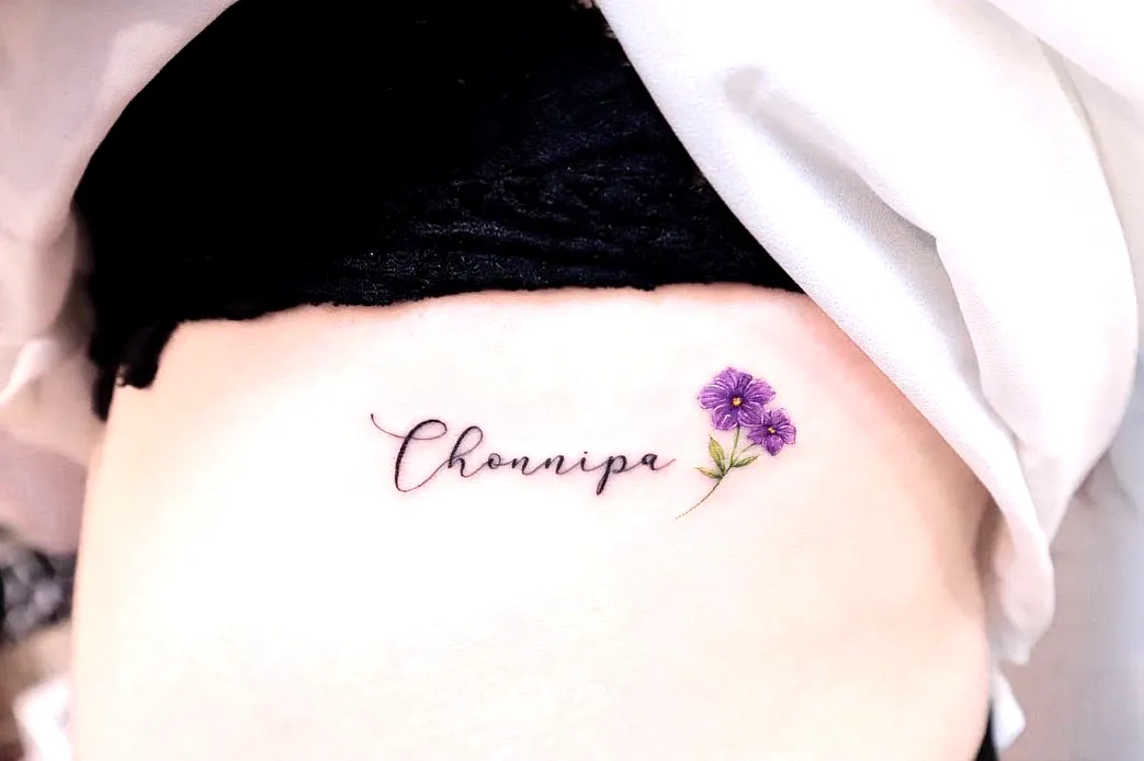 Violet Flower Lower Body Tattoo