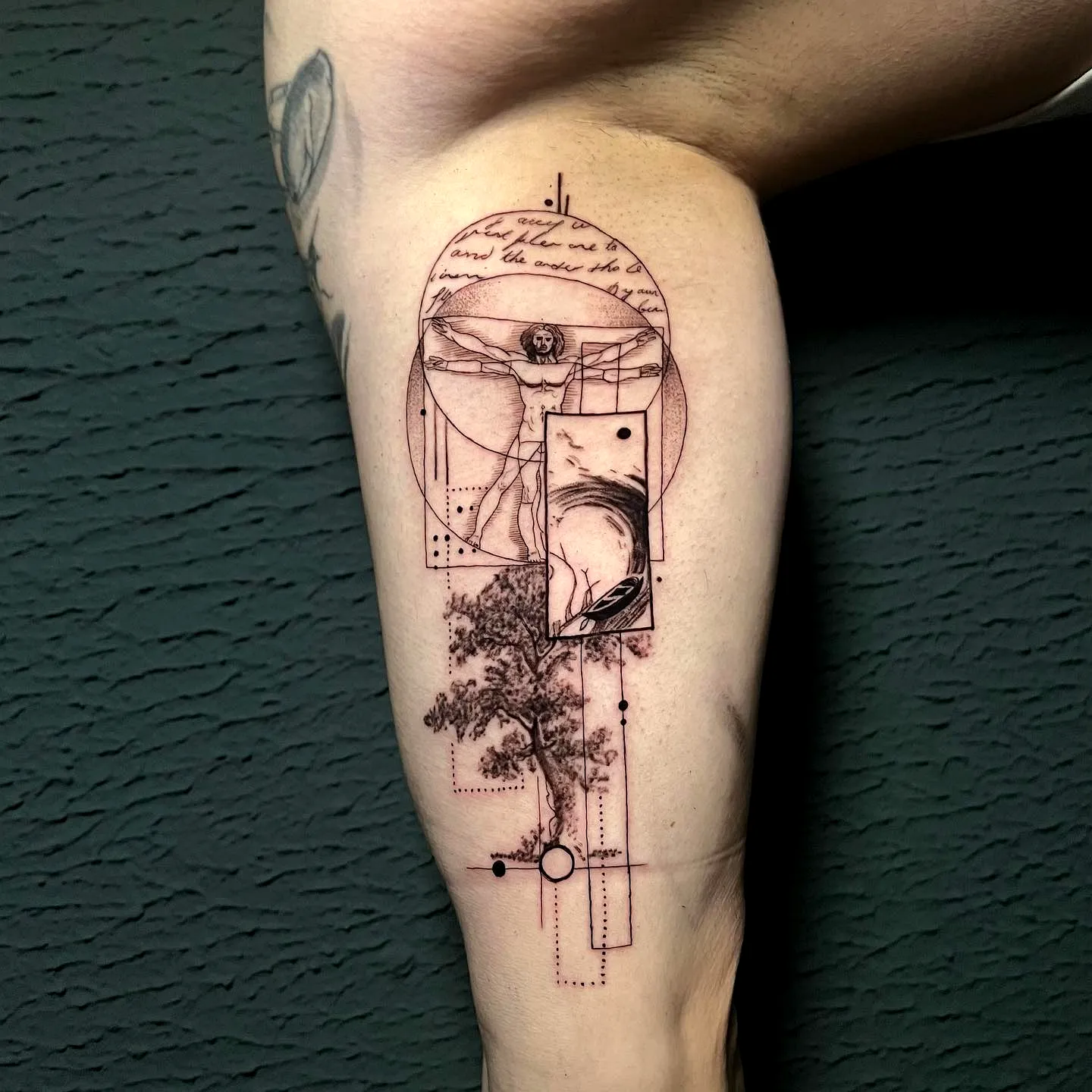 Vitruvian Man Thigh Tattoo with Geometric Elements