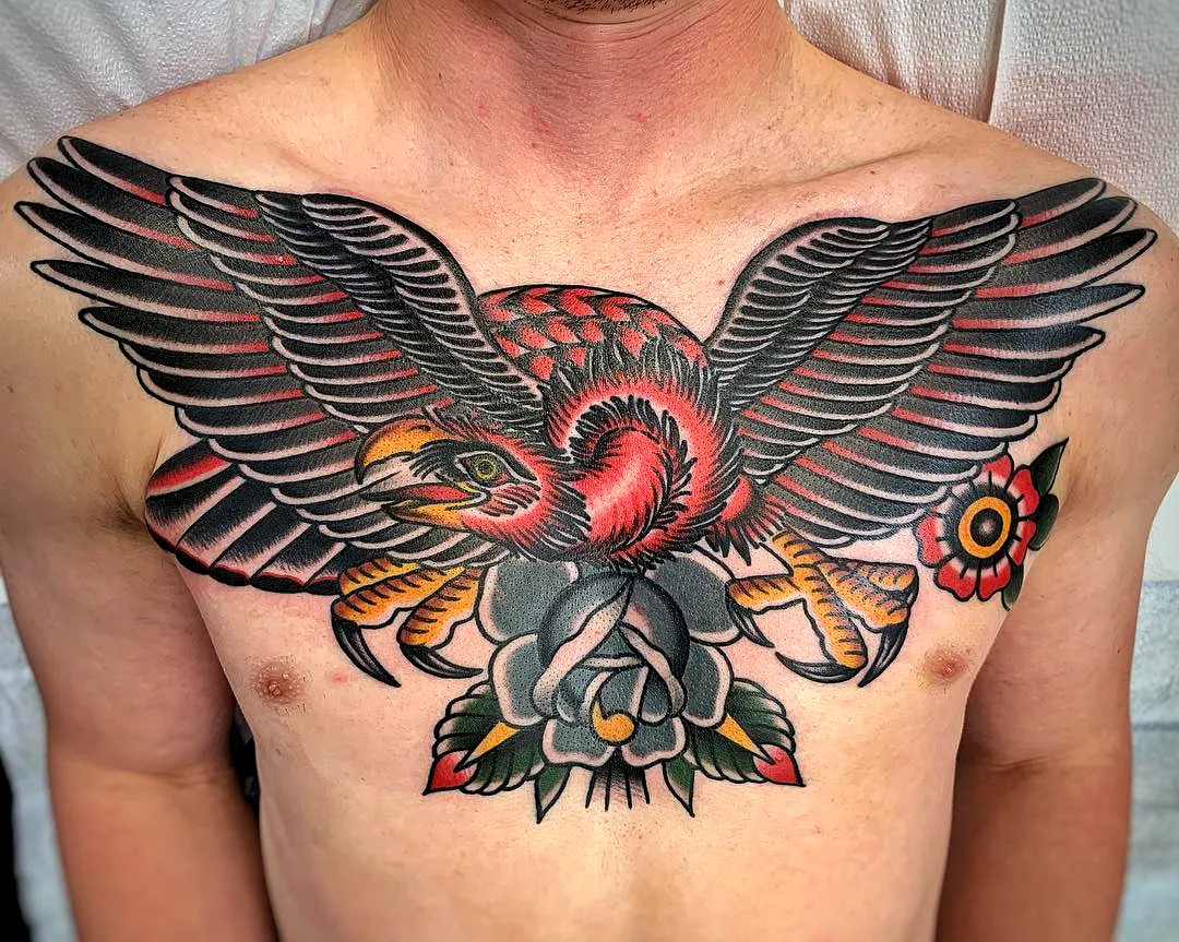 Vulture Chest Tattoo with Floral Elements