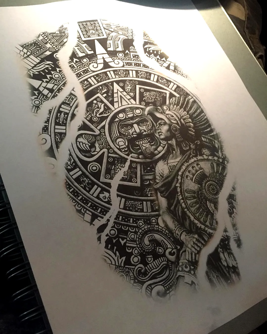 Warrior Arm Tattoo with Aztec Patterns