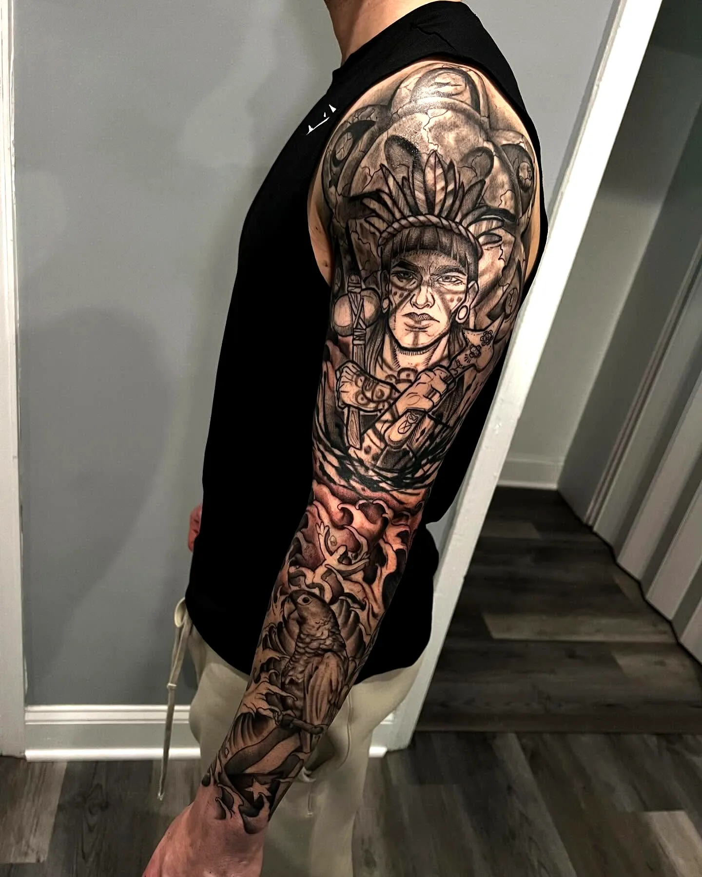 Warrior Face Arm Tattoo in Black and Gray