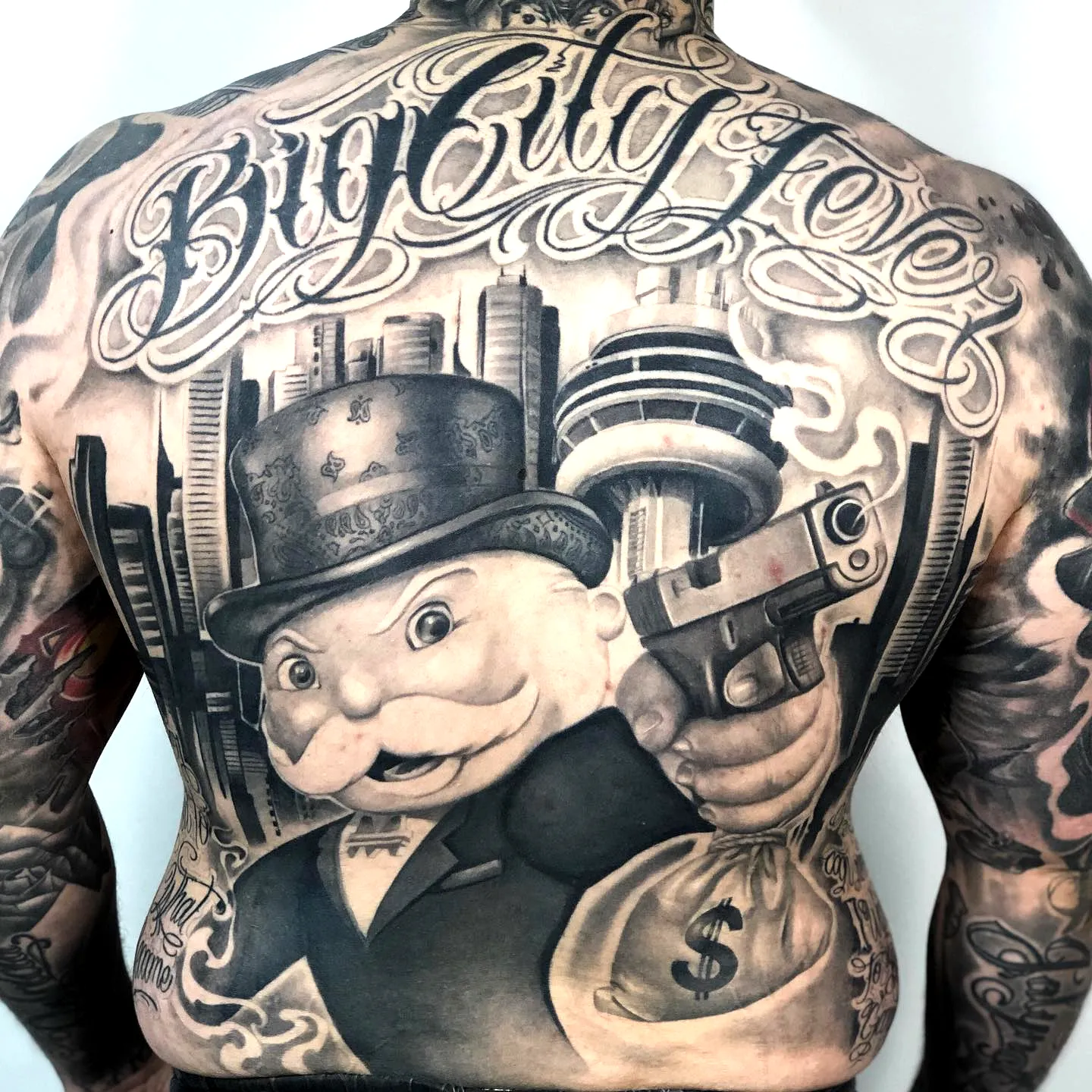 Wealthy Businessman Back Tattoo