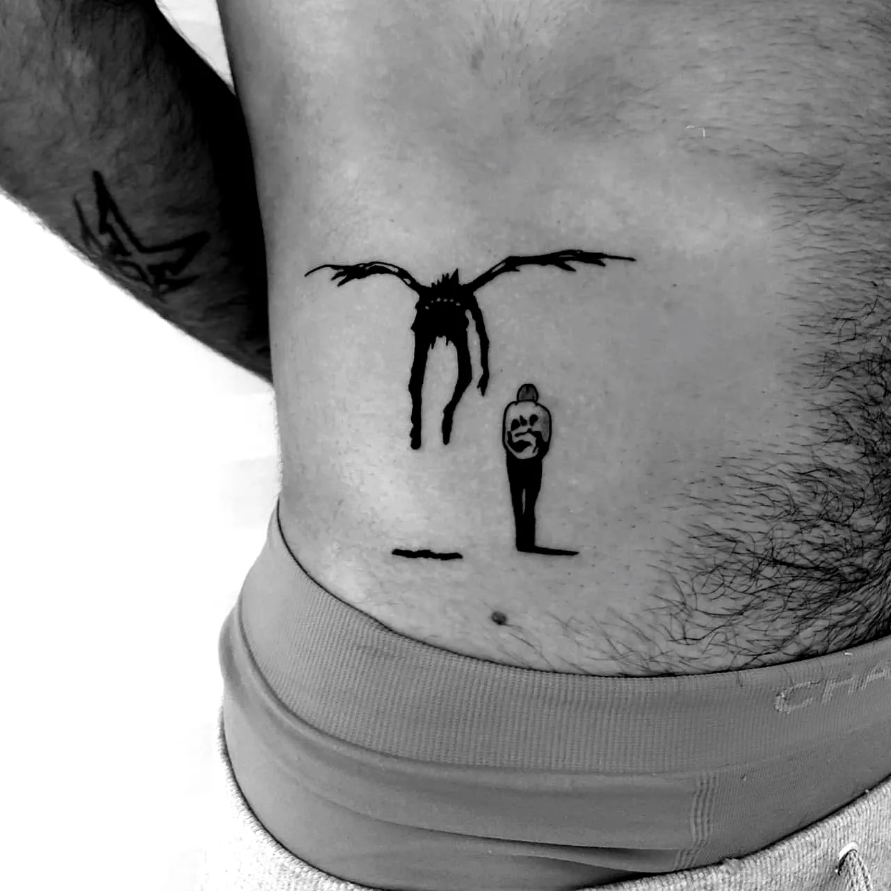 16 Striking Ryuk Tattoo Ideas for Creative Fans