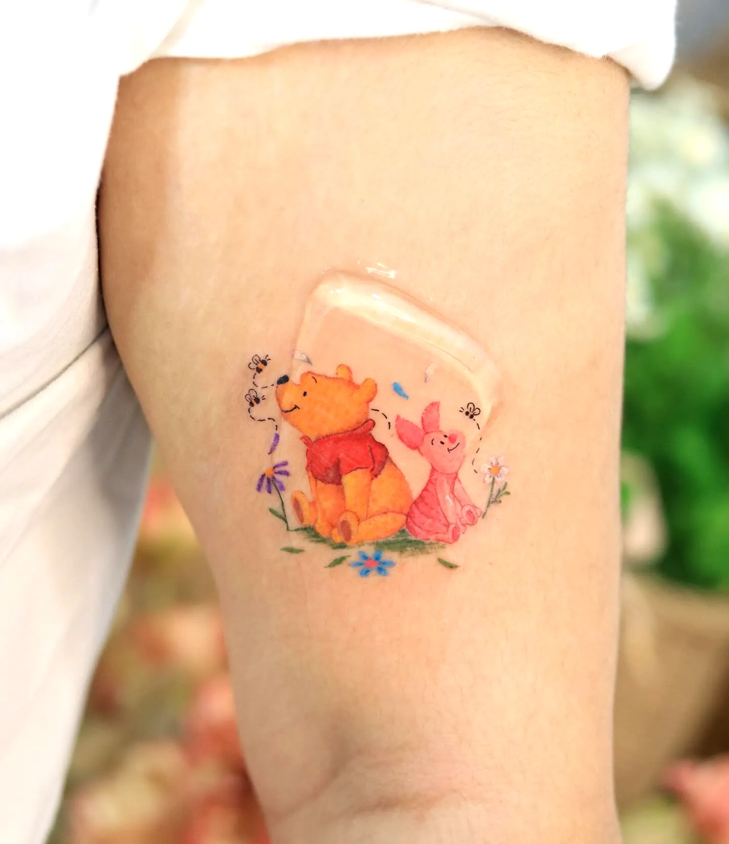Winnie-the-Pooh Pastel Inner Arm Tattoo