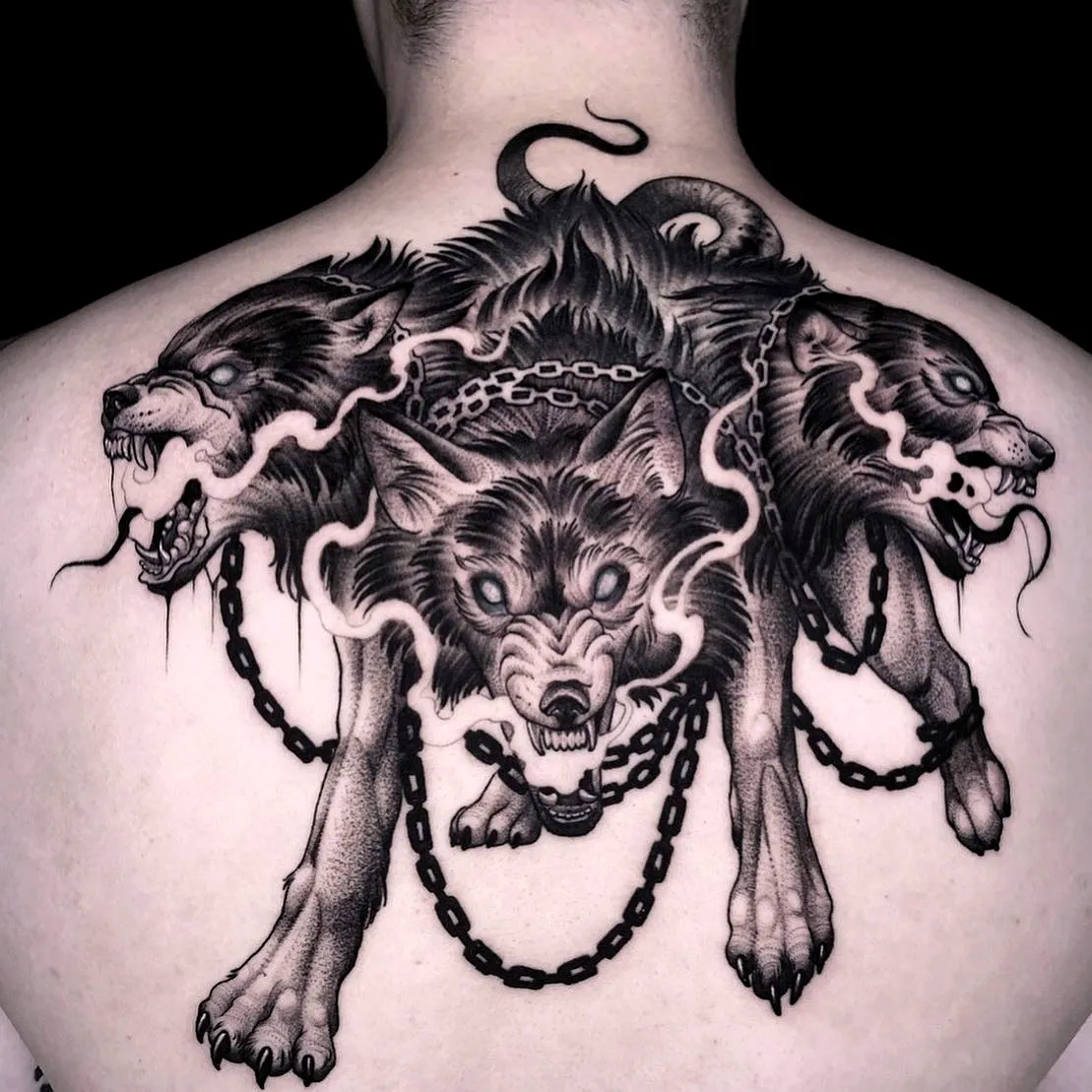 Wolf Upper Back Tattoo with Chains