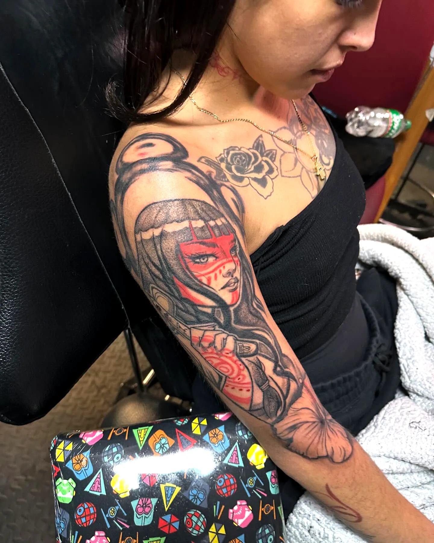 Womans Face Upper Arm Tattoo